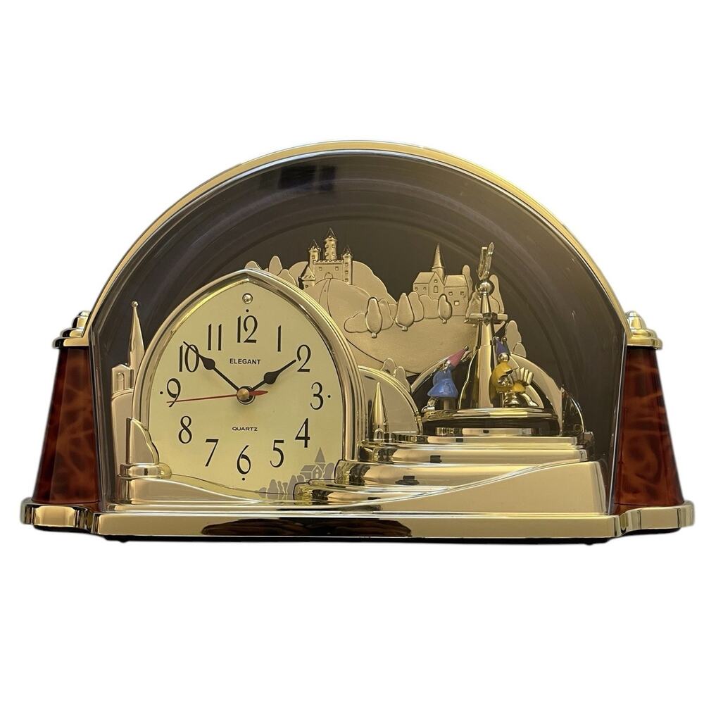 Elegant Quartz Rotating Pendulum Futuristic City Table Clock ~Gold Tone 13”Lx8”H